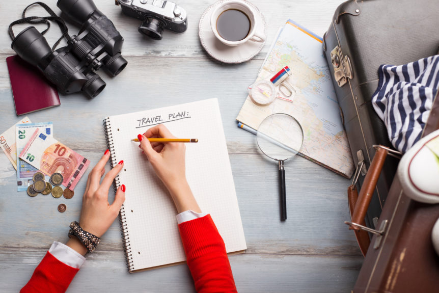 Woman making traveling plan