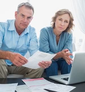 couple holding papers